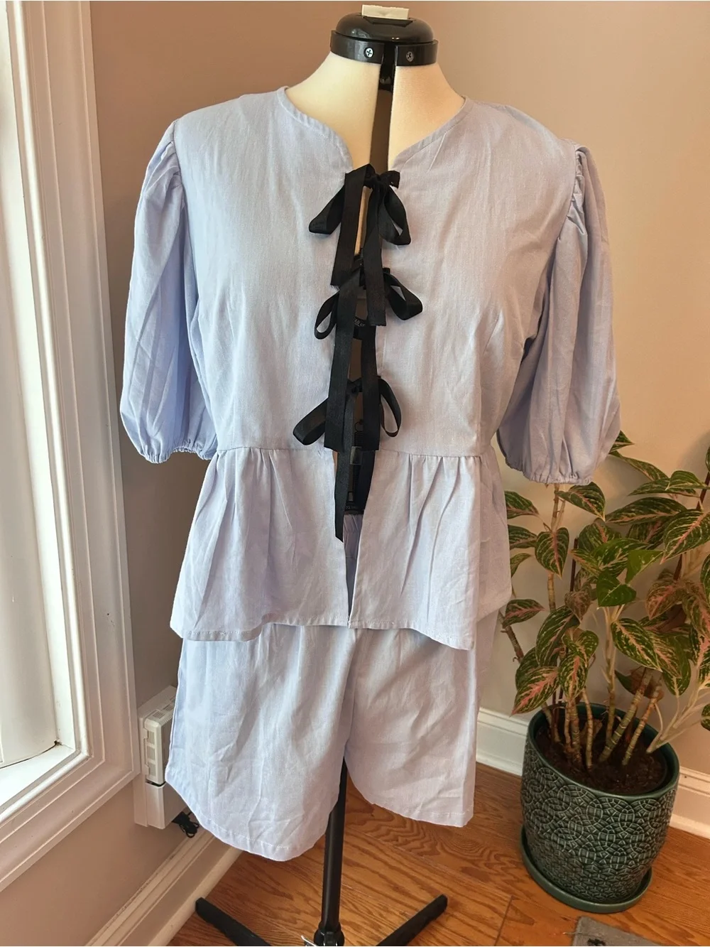 Shorts and blouse light blue set .